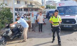 Manavgat’ta kaza anı: Bisikletli çocuğa çarpmamak için motosikletini devirdi