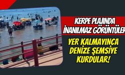 Kerpe Plajında İnanılmaz Görüntüler: Yer Kalmayınca Denize Şemsiye Kurdular!
