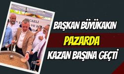 Büyükakın Pazarda Kazan Başına Geçti: Aşure Dağıtımına Vatandaş Akın Etti