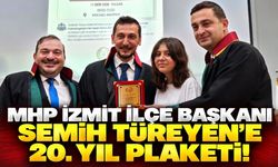MHP İzmit İlçe Başkanı Semih Türeyen’e 20. Yıl Plaketi