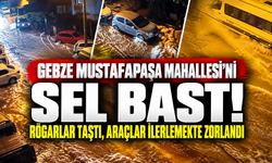 Gebze Mustafapaşa Mahallesi'ni sel bastı! Rögarlar taştı, araçlar ilerlemekte zorlandı