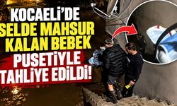 Kocaeli’de Selde Mahsur Kalan Bebek Pusetiyle Tahliye Edildi