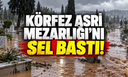Körfez Asri Mezarlığı'nı sel bastı! Yoldan gelen sular mezarları aşındırıyor