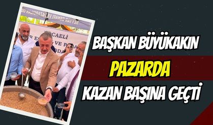 Büyükakın Pazarda Kazan Başına Geçti: Aşure Dağıtımına Vatandaş Akın Etti