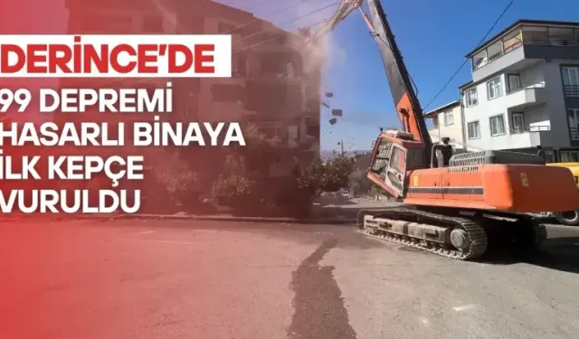 Derince'de 99 depreminden kalan tehlikeli binaya kepçe vuruldu