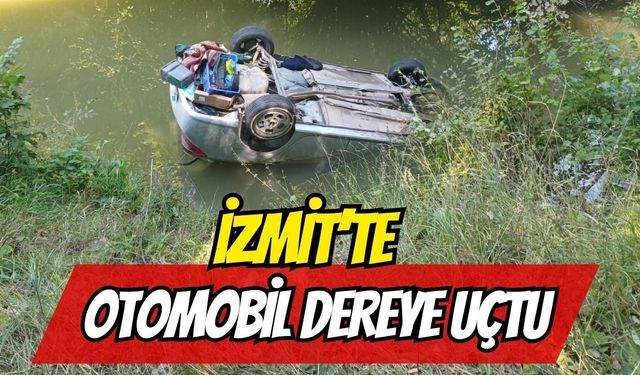 İzmit’te Kontrolden Çıkan Otomobil Dereye Yuvarlandı: Sürücü İtfaiye Ekiplerince Kurtarıldı